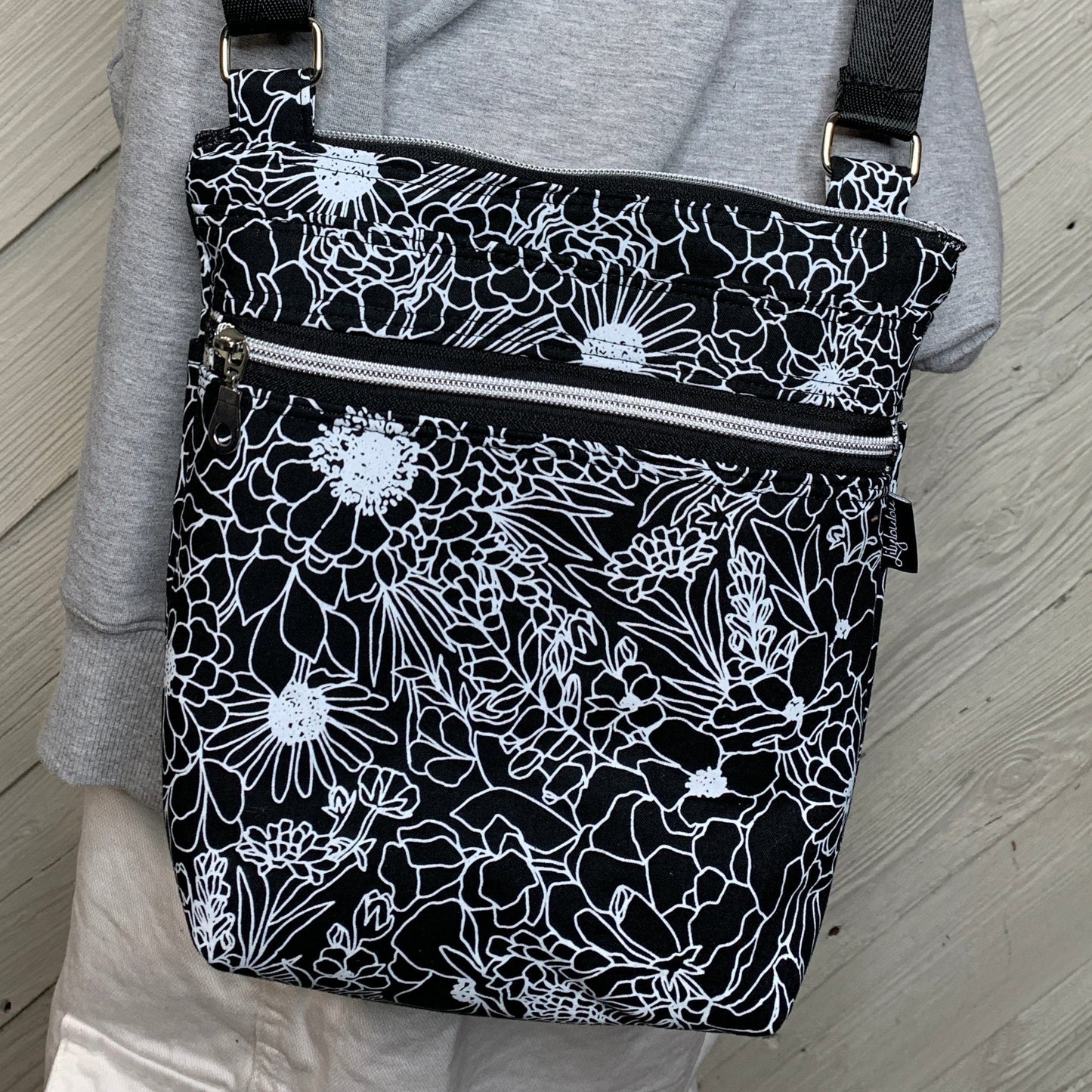 Crossbody Bag with a Black and White Flower Pattern