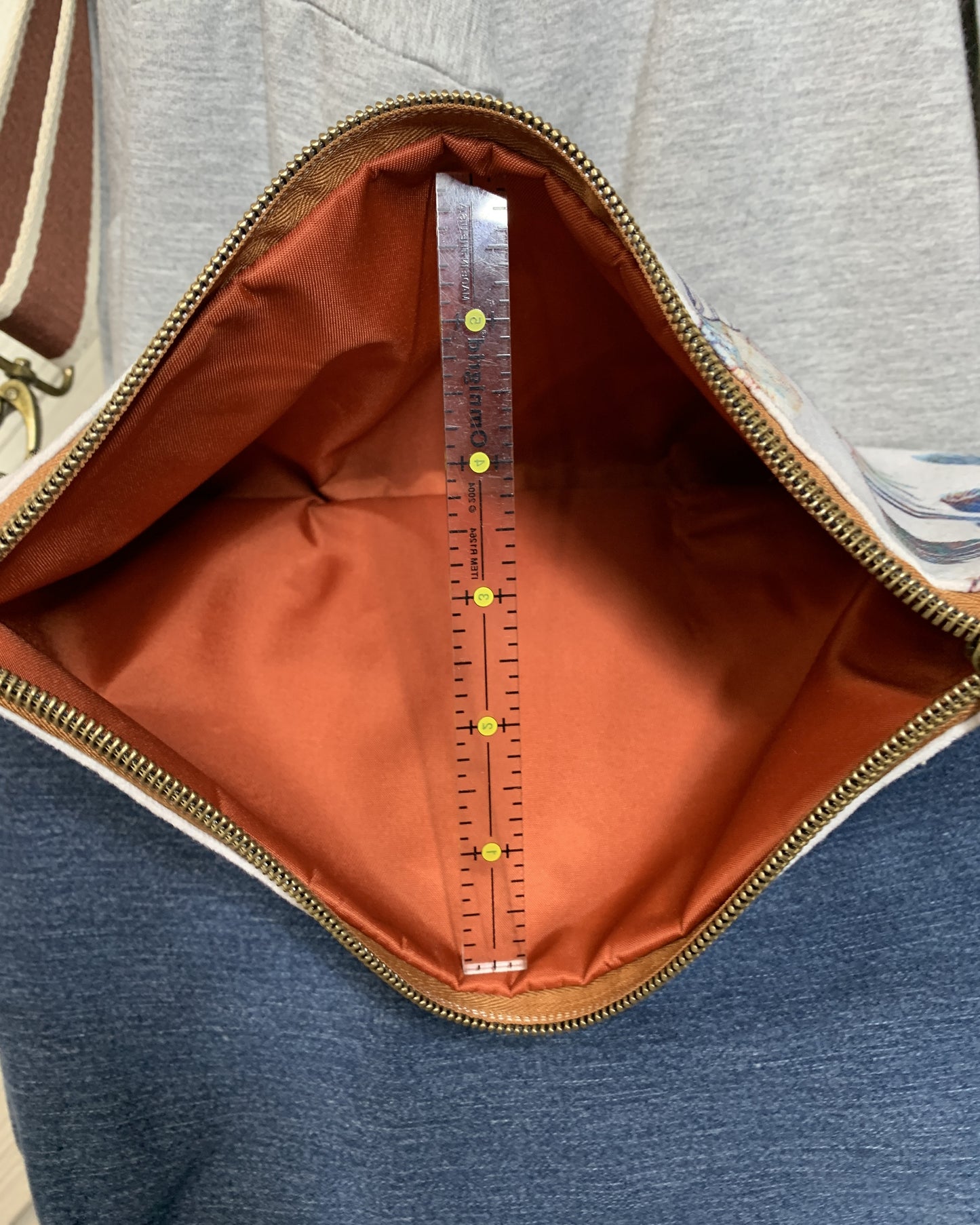 Foldover Crossbody Bag with a denim and floral Design