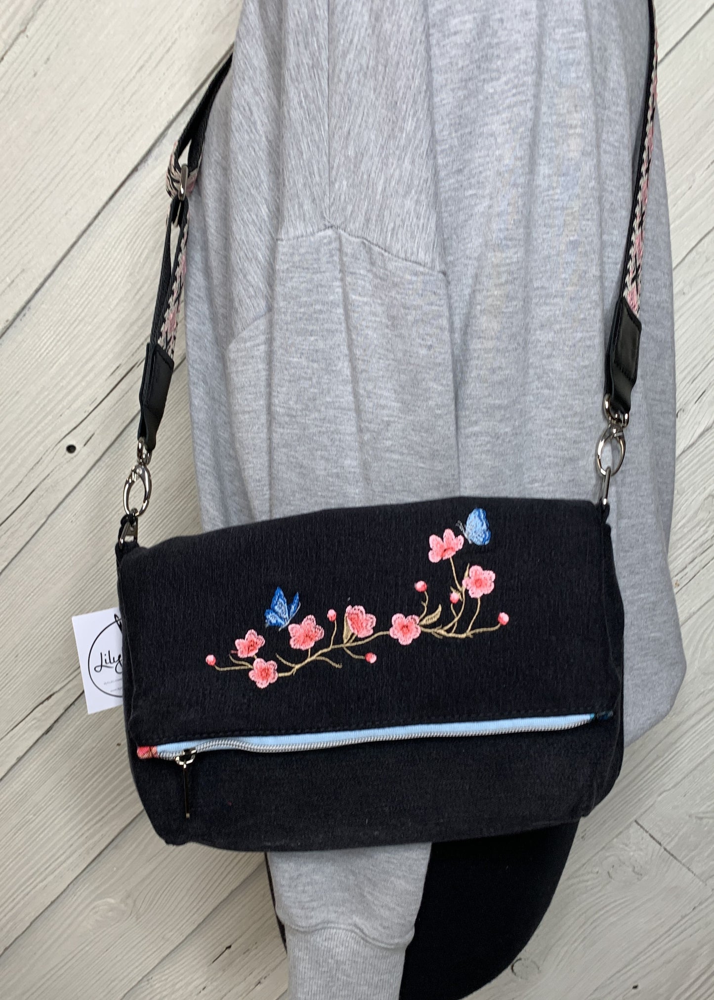 Foldover Crossbody Bag with a floral Design