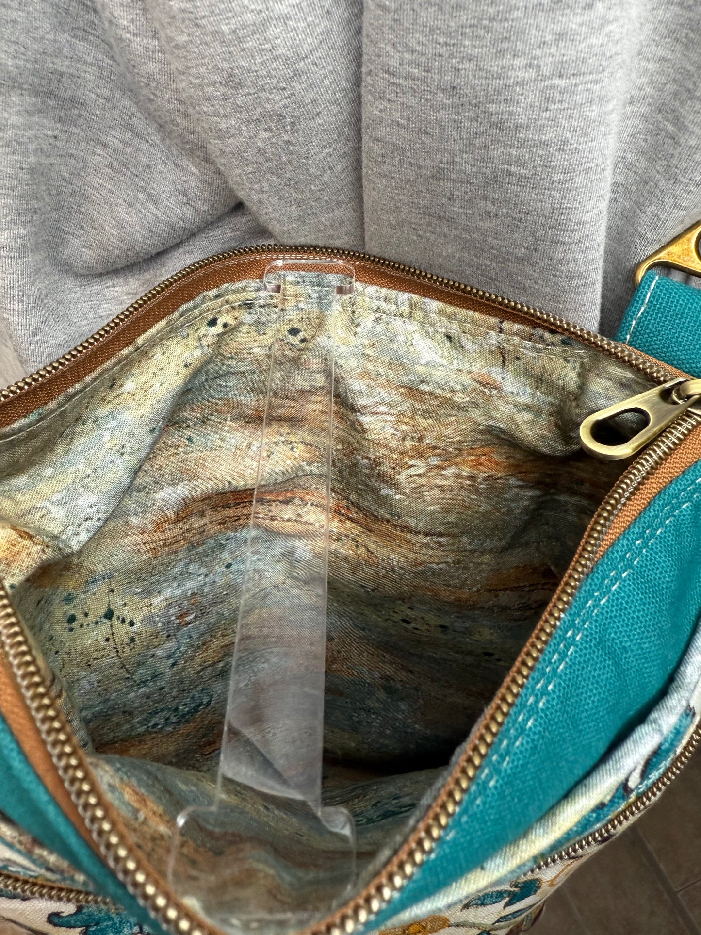 Crossbody Bag with teal geometric design