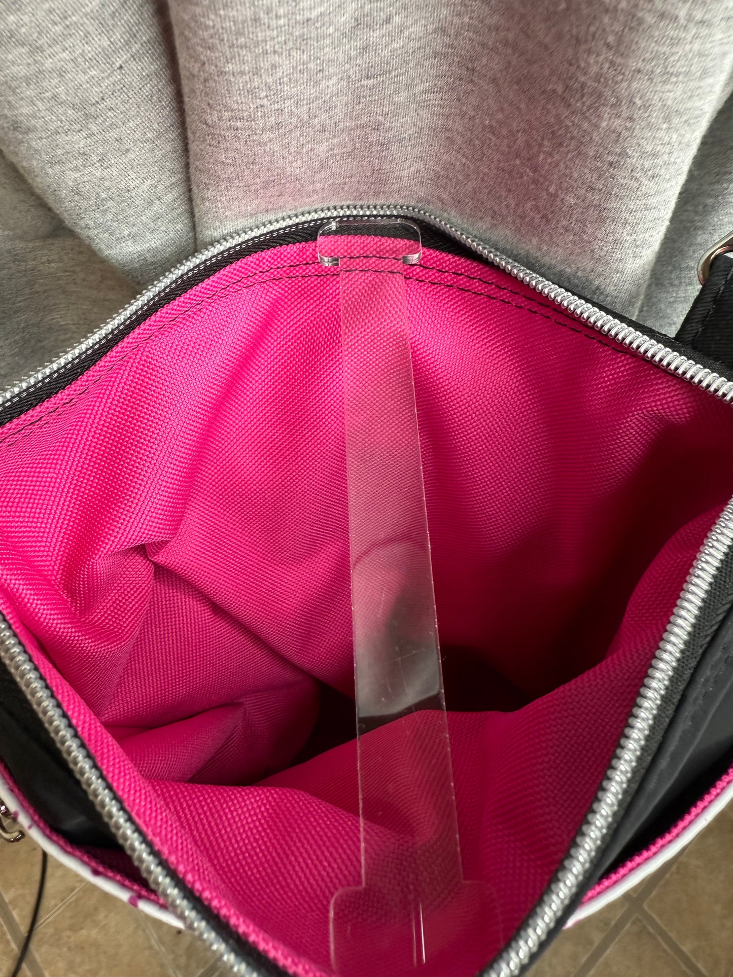 Crossbody Bag with black and white stripes with bright pink splashes
