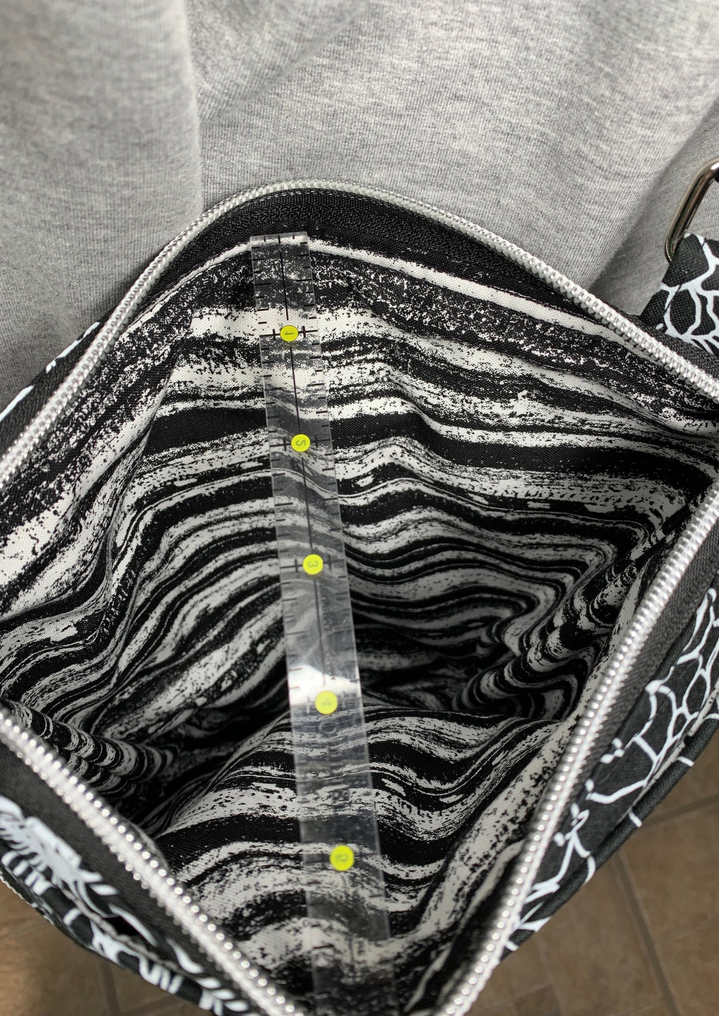 Crossbody Bag with a Black and White Flower Pattern