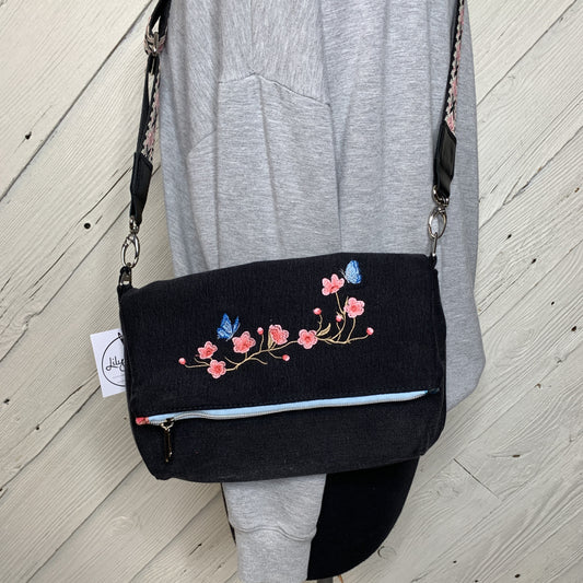 Foldover Crossbody Bag with a floral Design