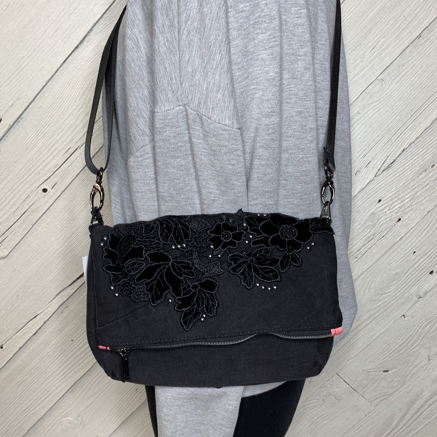 Foldover Crossbody Bag with a floral Design