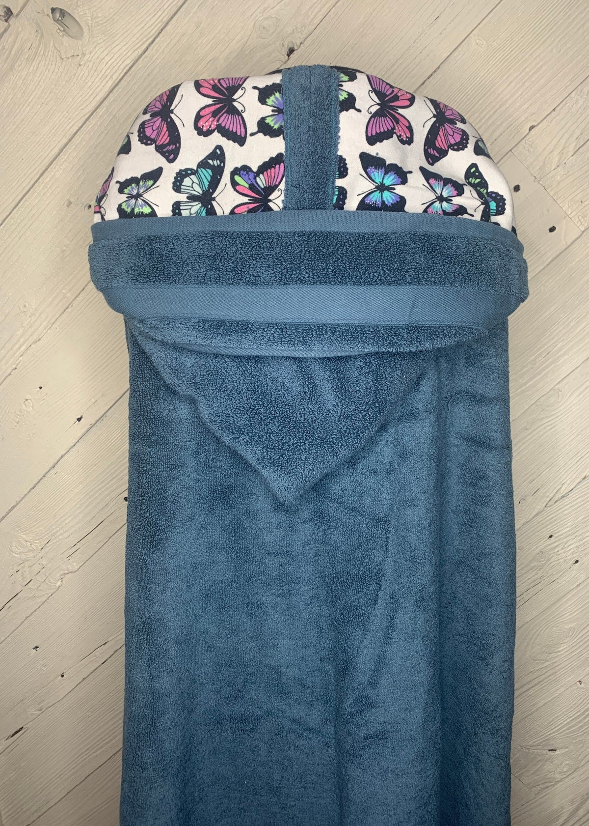 Teen hooded bath towel with optional butterfly flannel