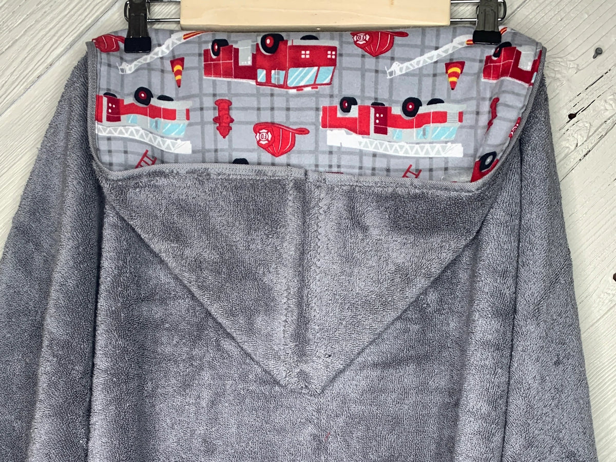 Gray Kid's Hooded Bath Towel with Fire Truck Lining on Hood