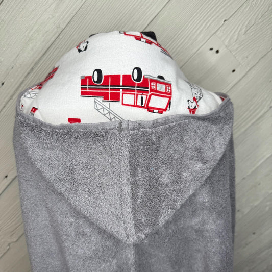 Hooded towel or hooded poncho towel with fire trucks